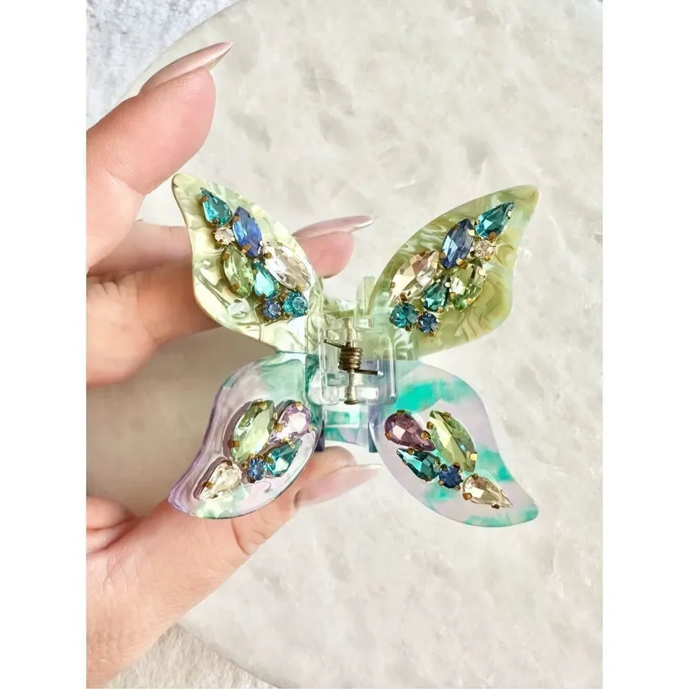 Blue and green rhinestone embellished butterfly hair claw ￼